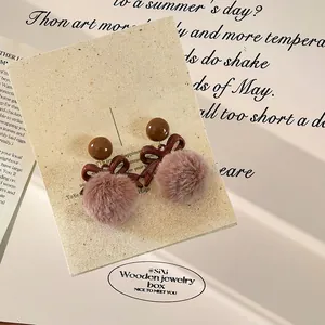 Elegant bow and fur ball earrings with silver needles for autumn winter fashion jewelry