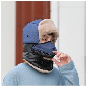 Detail of winter trapper hat with integrated mask and thick faux fur lining for warmth