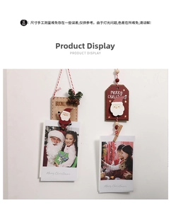 Detail of wooden Christmas photo clips with Santa Claus design and hanging ropes
