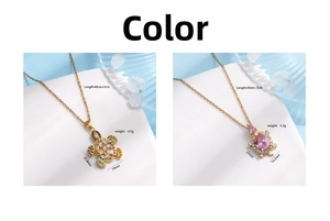 Macro view of gold turtle pendants with colorful zircon and pink stone inlays