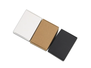 Three-color small kraft cardboard boxes in white, brown, and black for jewelry packaging