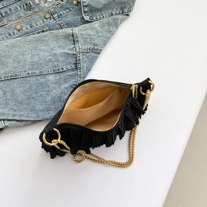 Pleated black shoulder bag with gold chain and interior zip pocket on white background