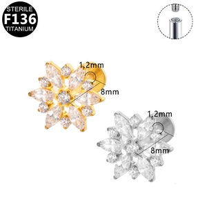 Detail of flower zircon F136 titanium labret studs in gold and silver showing thread specs