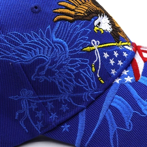 Macro shot of high-density eagle and star embroidery on dark blue baseball cap