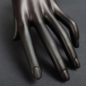 Detailed view of professional matte black female mannequin hand for jewelry display