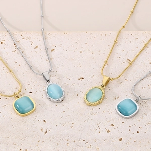 French vintage stainless steel necklace with light blue cat eye stone pendants