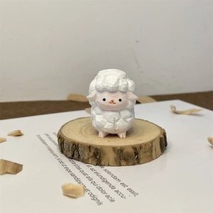 Detailed macro view of a handcrafted white wooden sheep figurine with pink accents