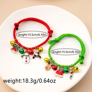 Detailed view of 15.5cm woven Christmas bracelets with festive enamel charms and bells