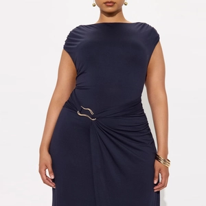 Detail of navy blue sleeveless dress with gold metal buckle and pleated waist design