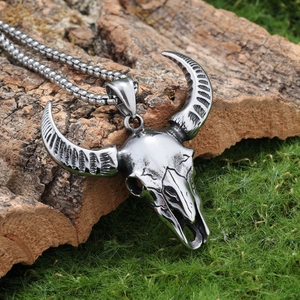 Vintage gothic ram skull stainless steel pendant necklace on natural moss and bark
