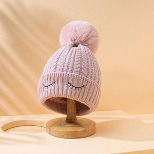 Berretto in maglia rosa con ricamo occhi, pompon in pelliccia e calda fodera in pile