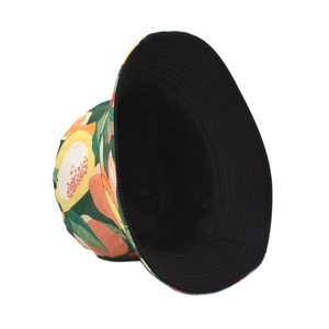 Detail of reversible bucket hat showing tropical fruit print and black inner side