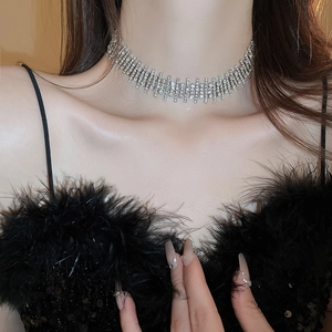 Sparkling silver rhinestone choker necklace with irregular geometric tassel design