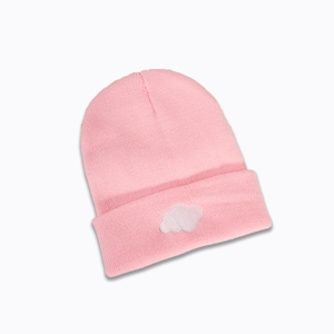 Detailed view of pink ribbed beanie with white cloud embroidery and soft texture