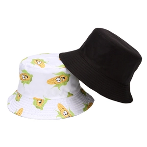 White bucket hat with corn embroidery and black reversible style sun protection hat