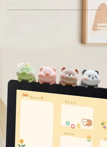 Mini fuzzy animal screen ornaments featuring dinosaur, pig, bear, and panda figurines