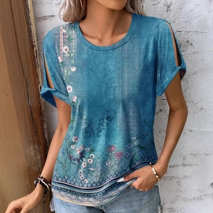 Women's blue floral short sleeve T-shirt with cutout shoulder design in retro style