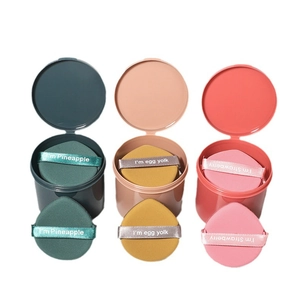 Three-piece non-latex cushion puff set with storage jars in yellow, pink and green