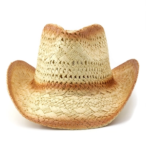 Detail of breathable hand-woven straw cowboy hat with classic cattleman crown and curved brim