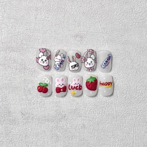 Nail art stickers met reliëf, aardbei- en konijnpatronen en 3D-snoepjes decoraties