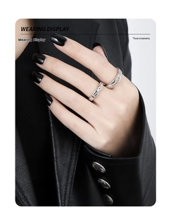 Wearing display of textured S925 sterling silver rings with crystal stones on leather