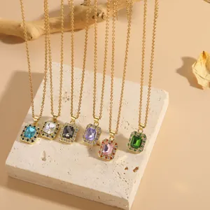 Detail of square zircon pendants in six colors on golden titanium steel chain