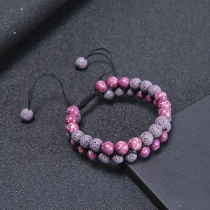 Double-layer braided bracelet with purple imperial stones and black volcanic lava beads