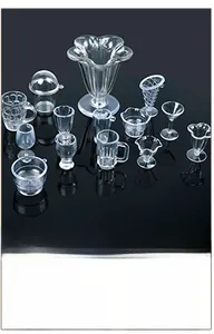 Detailed overhead view of miniature clear resin dollhouse cups for DIY food play