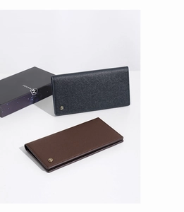 Detail of navy blue and brown long wallets with cross grain texture and logo box