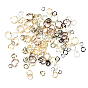 Assorted open jump rings in gold silver and bronze for DIY jewelry making