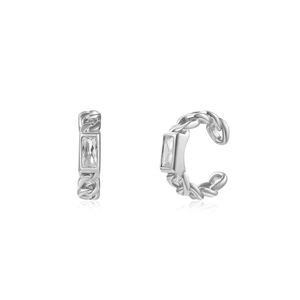 Detail of silver twisted metal ear cuff featuring a rectangular baguette cubic zirconia
