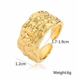 Detail showing 1.2cm width and 6g weight of a gold-plated heart ring with lava texture