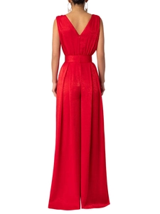 Rear view of bright red backless sleeveless jumpsuit with glossy satin fabric texture