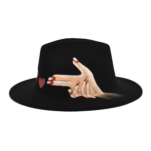 Detail of hand-painted heart gesture art on black wool felt fedora sun hat
