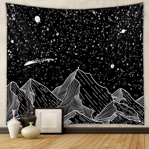 Minimalist black and white mountain tapestry featuring starry night sky and line art design