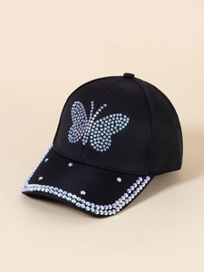 Close-up of a black baseball cap with rhinestone butterfly and crystal brim details