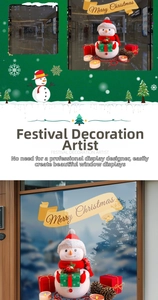 Dettaglio di adesivi natalizi 3D con pupazzo di neve e striscione Merry Christmas