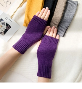 Detail of purple knitted fingerless gloves for women with colorful multi-pack selection