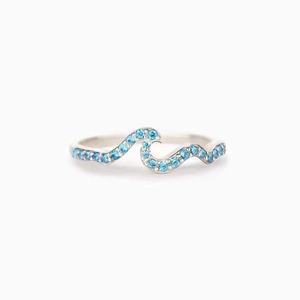 Elegant wave-shaped S925 sterling silver ring with light blue zircon stones
