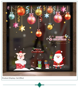 Festive Christmas window stickers with Santa, reindeer and colorful holiday baubles