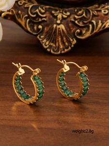 Detail of 18K gold plated stainless steel hoops with square green zircon, weight 2.8g
