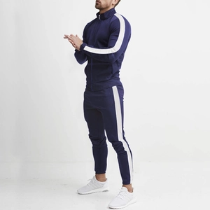 Detailed view of dark blue athletic set with white side stripes and stand collar zip jacket