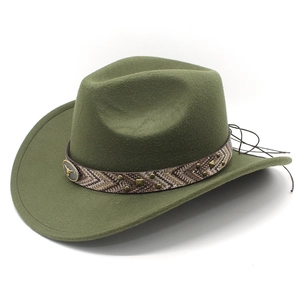 Detail of olive green fedora featuring ethnic ribbon, metal studs and bull head logo