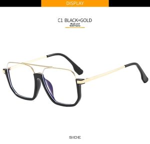 Side view of square black and gold glasses frame with stylish double bridge design