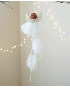 Detail of handmade Christmas angel ornament with white mesh skirt and feather wings