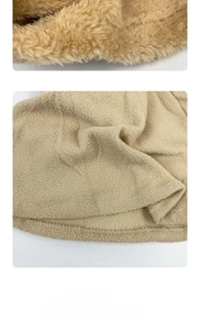 Detail of thick khaki fleece lining and plush faux fur material for winter hat