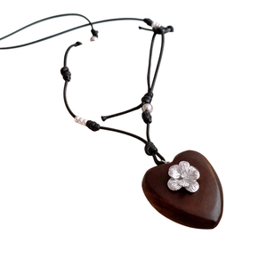 Retro leather and wood beaded heart pendant necklace on a long black braided cord