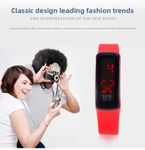 Detail of red LED digital sports watch with integrated silicone strap and bright display
