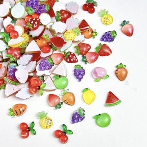 Variety of mini resin fruit charms including strawberry, cherry, and watermelon for DIY nail art