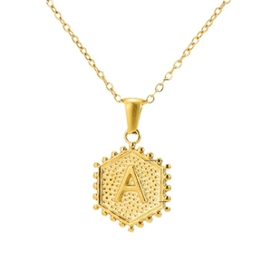 Gold hexagon pendant necklace with letter A and vintage texture on a dainty chain